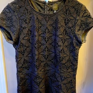 Embroidered peplum top